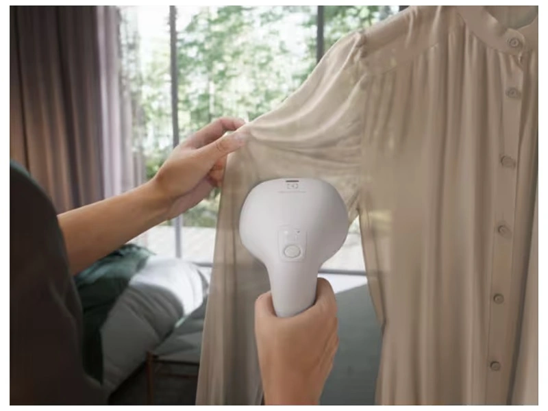 Відпарювач Electrolux компактний, 1600Вт, 100мл, постійна пара - 28гр, керамічна підошва, бежевий - 2