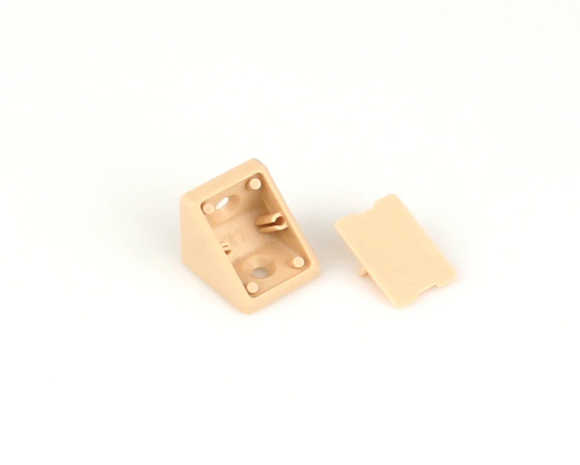 Крепежный уголок Komandor пластиковый малый 55-0101BE Бежевый Крепежный уголок Komandor пластиковый